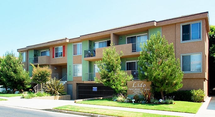 Apartment building with the name Lido on the front.