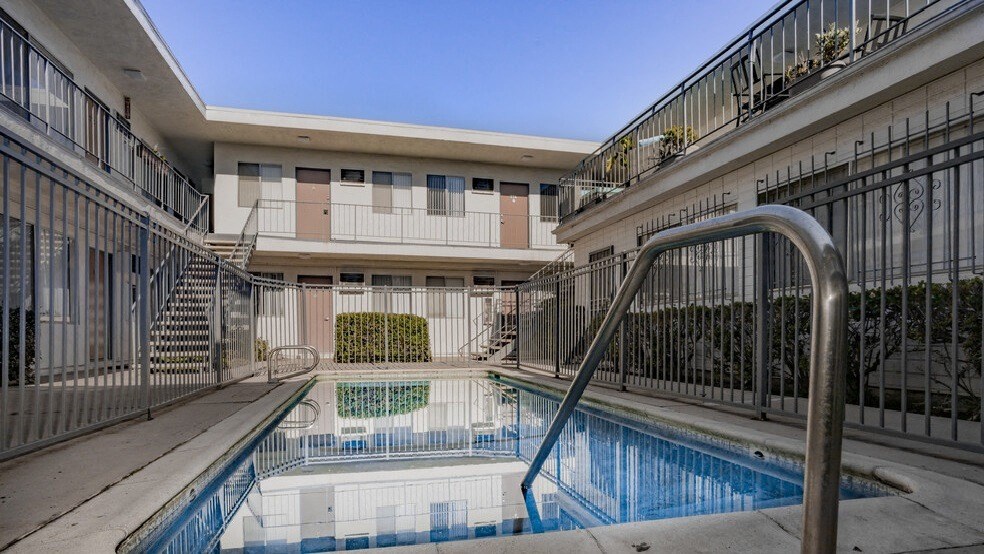 A small pool in a courtyard at Lido Apartments - 3610 Midvale Ave, Los Angeles, CA, 90034