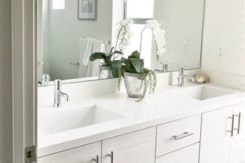 Renovated Bathrooms With Quartz Counters at Lido Apartments - 4025 Grandview, California