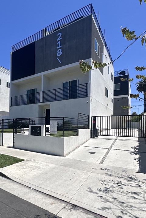 A modern building with the number 218 on it.