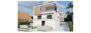 A modern two-story house with a flat roof and a balcony on the second floor.