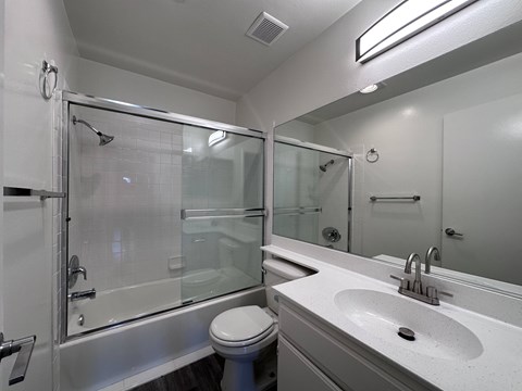 White Bathroom at Lido Apartments - 3745 Glendon Ave, Los Angeles, 90034