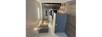 a kitchen with a refrigerator and a counter top