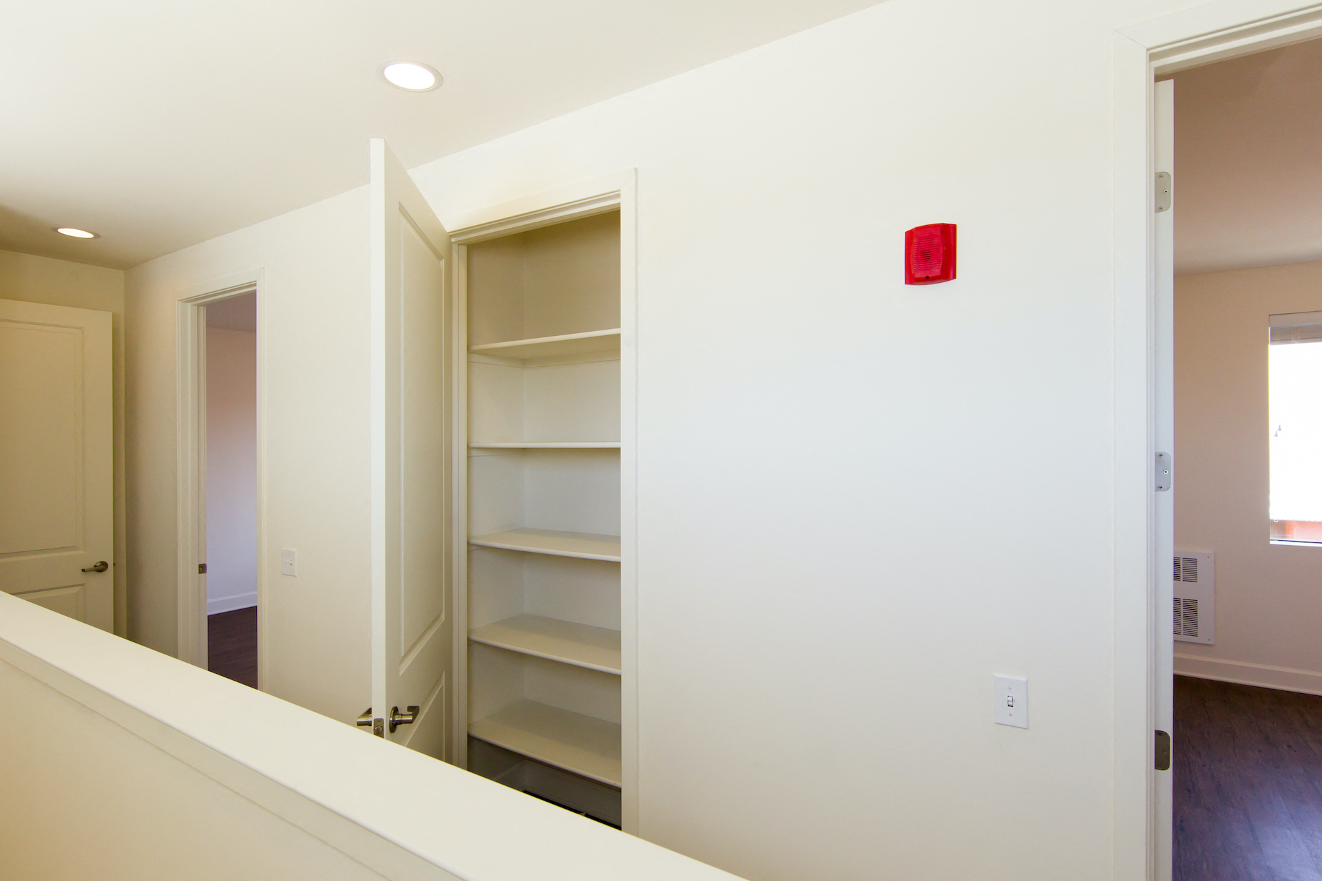 Roundhouse Place Three Bedroom Upper Floor Hallway with Linen Closet  at Roundhouse Place, California