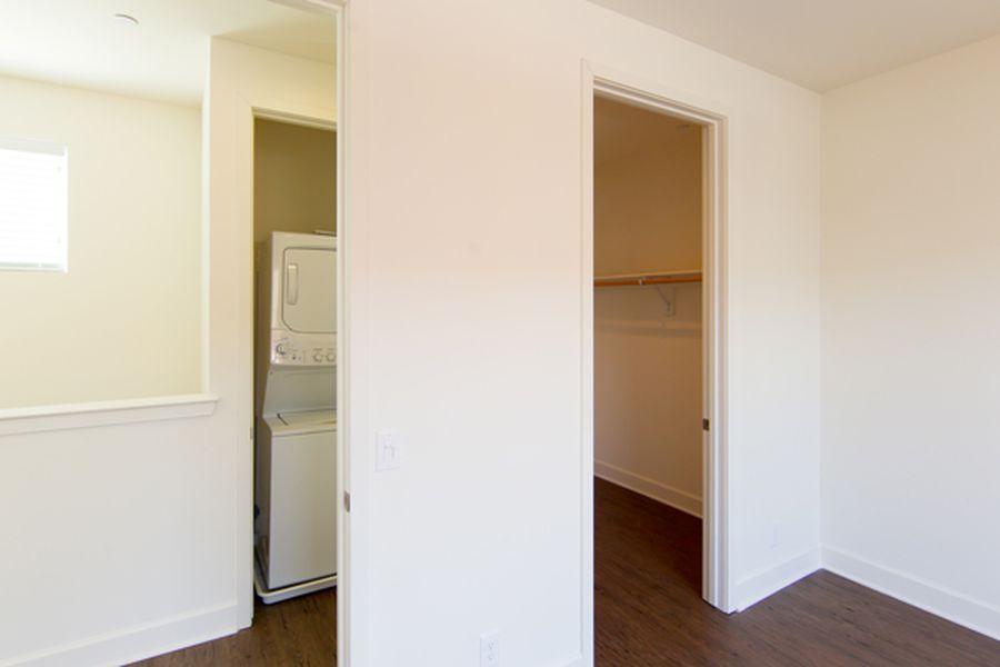 Roundhouse Place Three Bedroom Upper Floor Bedroom  and Laundry Closet at Roundhouse Place, San Luis Obispo, CA