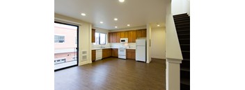 Roundhouse Place Two and Three Bedroom Open Living and Kitchen Area with Sliding Door to Patio  at Roundhouse Place, California, 93401