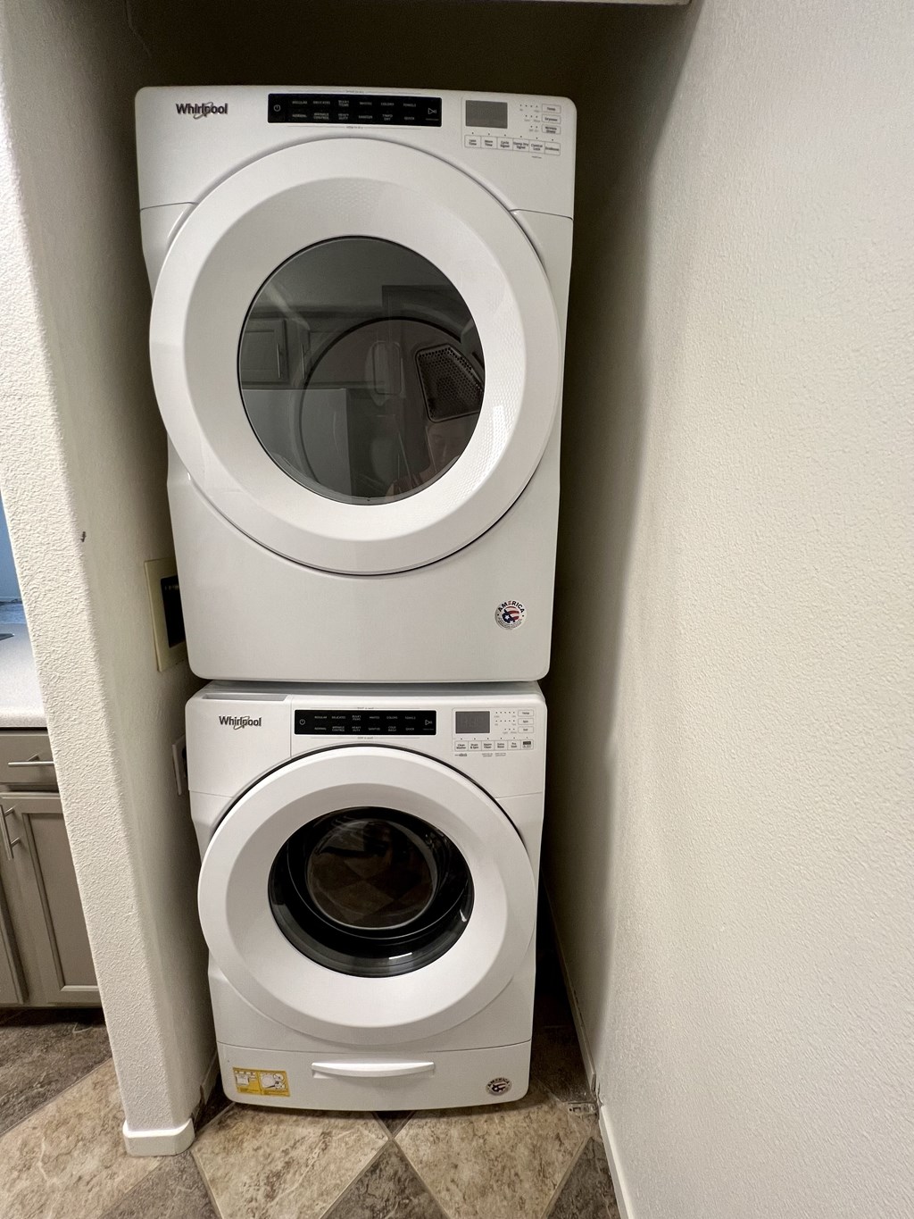 a washer and dryer in the laundry room at Villa Mondavi, Bakersfield, CA