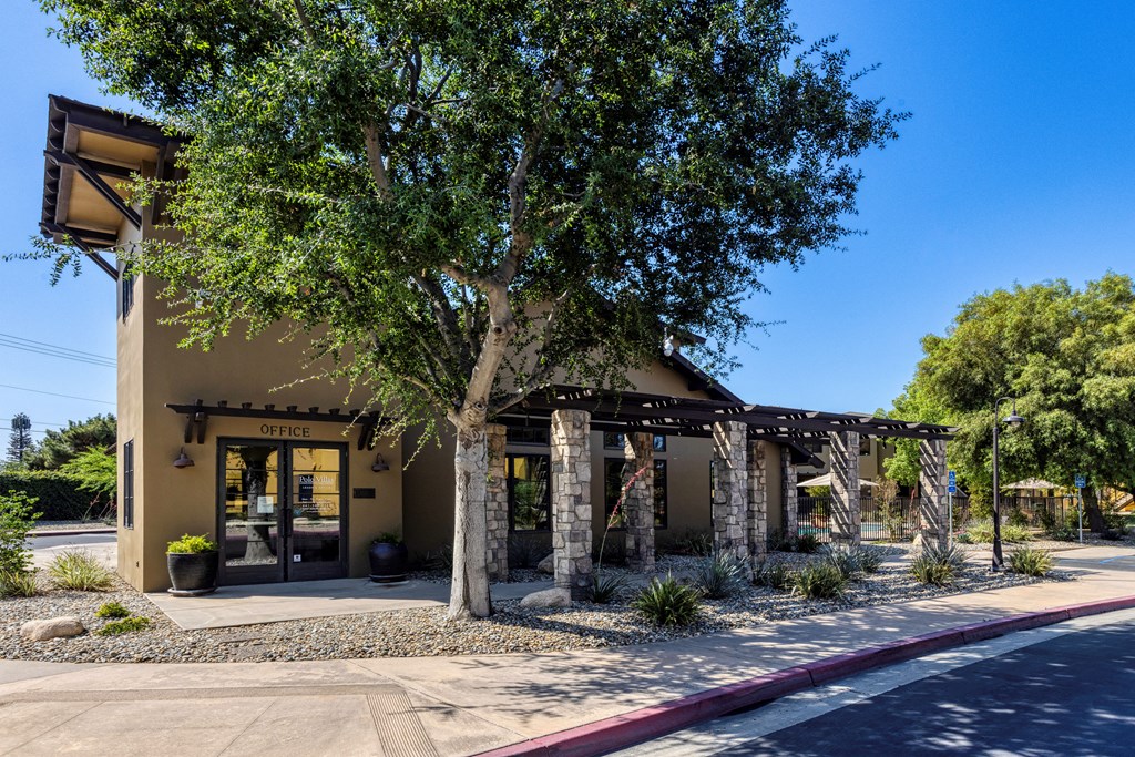 a building with a tree in front of it  at Polo Villas, Bakersfield, CA, 93312