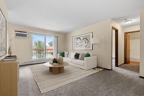 a living room with a couch and a table