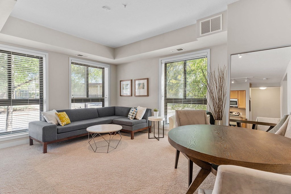 a living room with a couch and a table