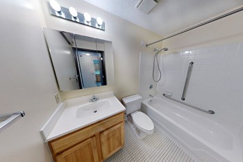 a bathroom with a sink toilet and bathtub - Photo Gallery 2