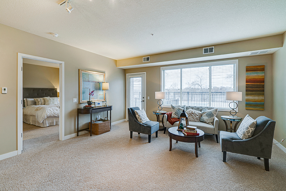 Living room and an open door to a bedroom