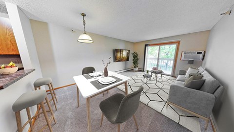 an image of a living room with a table and chairs