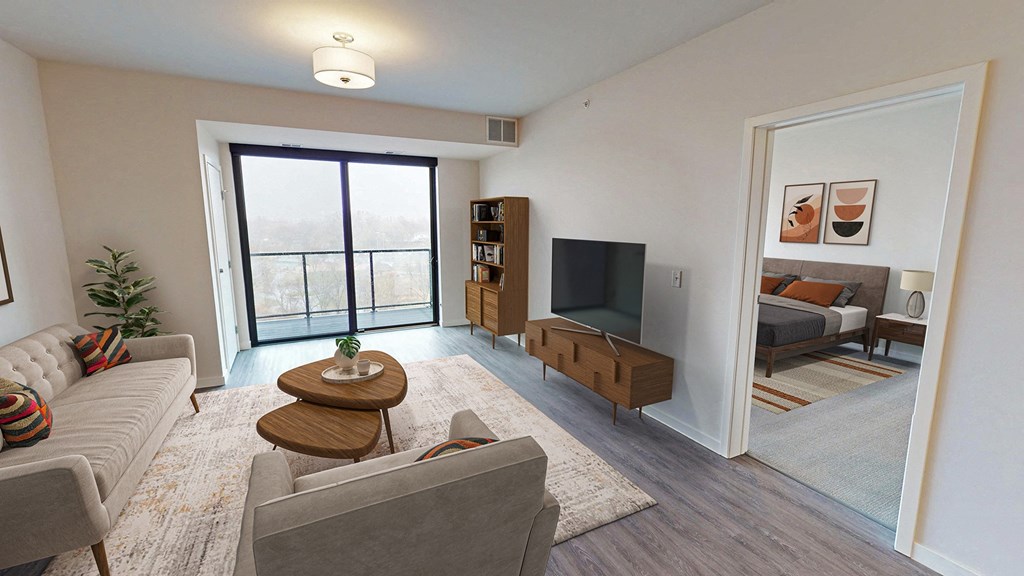 a living room with a couch and a tv