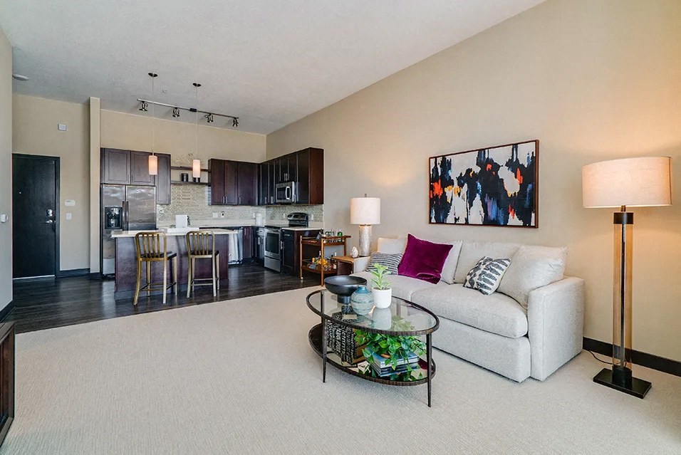 a living room with a couch and a table