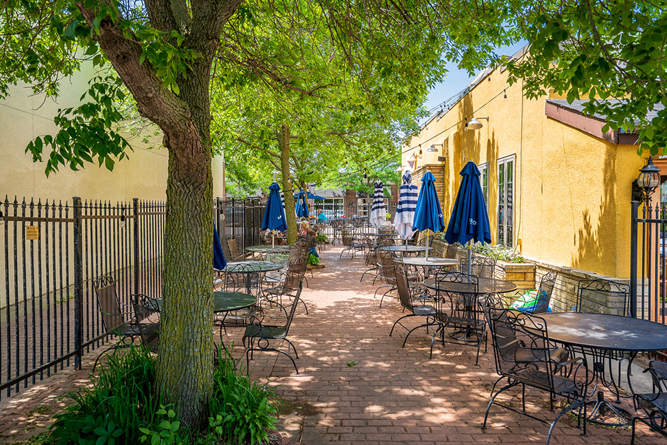 Outdoor restaurant seating on a sunny day