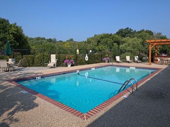 Heated outdoor pool with patio