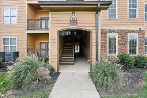 A building with a staircase leading to the entrance.
