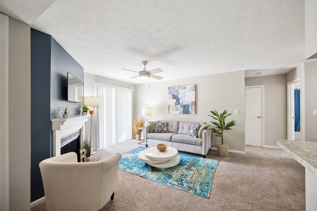 the preserve at ballantyne commons living room and fireplace at River Oak Apartments, Louisville