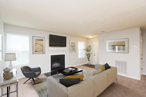 the preserve at ballantyne commons living room with couch and fireplace