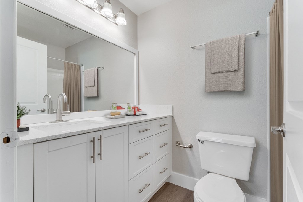 bathroom with a shower at Palm Crossing Apartments in Winter Garden, FL