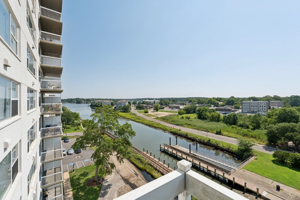 the view from the balcony of an apartment building overlooking a river at The Lafayette Apartments, Colonial Place, Norfolk