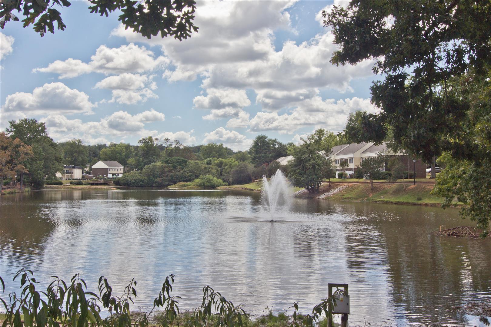 Lake with fountain at Lakecrest Apartments, PRG Real Estate Management, Greenville, SC, 29615