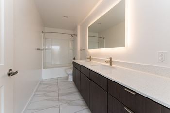 Bathroom with Large Mirror at South Falls Tower, Richmond, Virginia