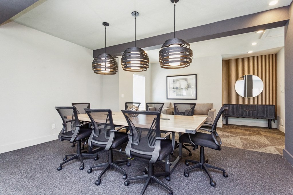 a conference room with a long wooden table and chairs  at Palm Crossing, Florida, 34787