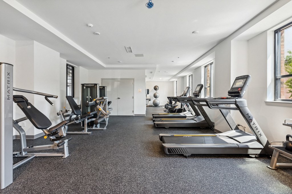 a gym with treadmills and other exercise equipment at The Constellation Apartments, PRG Real Estate, Hampton, Virginia