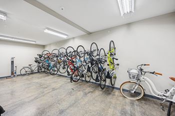 A room full of bicycles of different colors and types.