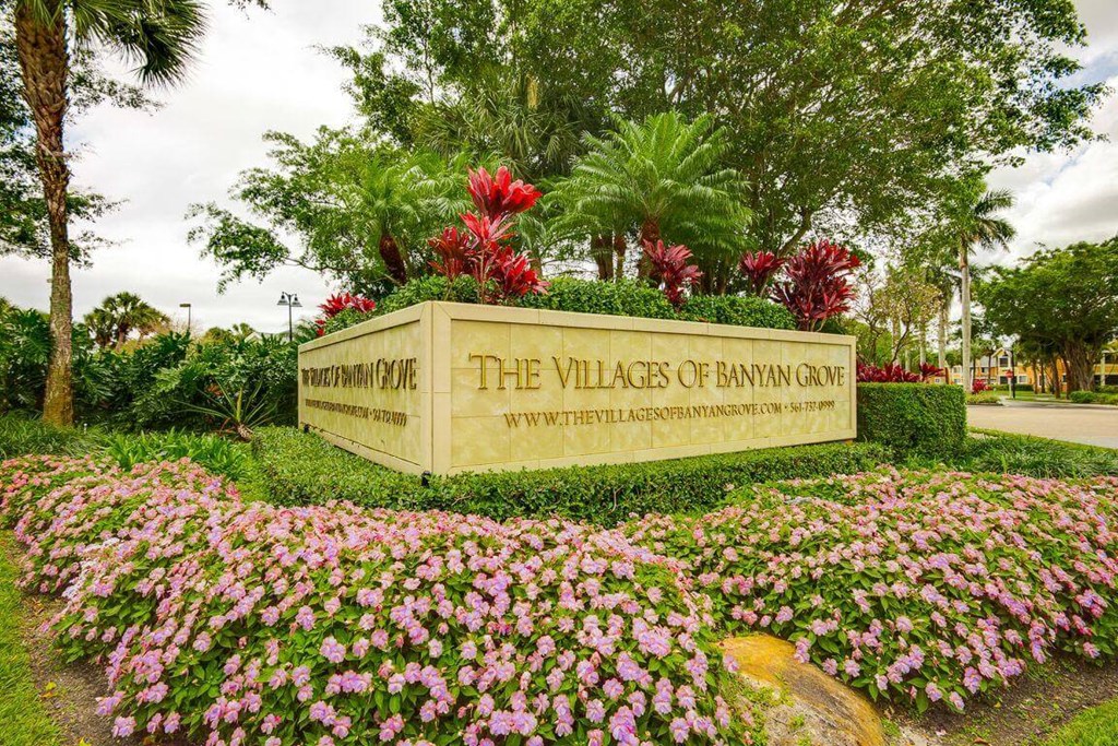 Entrance sign at The VillagesApartment  of Banyan Grove Apartments in Boynton Beach FL
