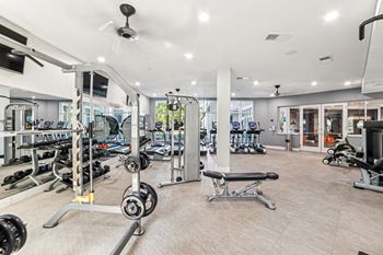 A spacious gym with a variety of equipment at Proximity Apartments, Charleston, SC