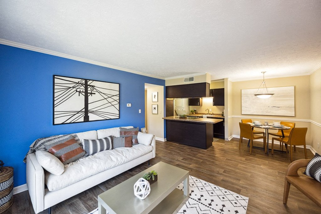 Living Room With Kitchen View at The Grove at Lyndon, Kentucky