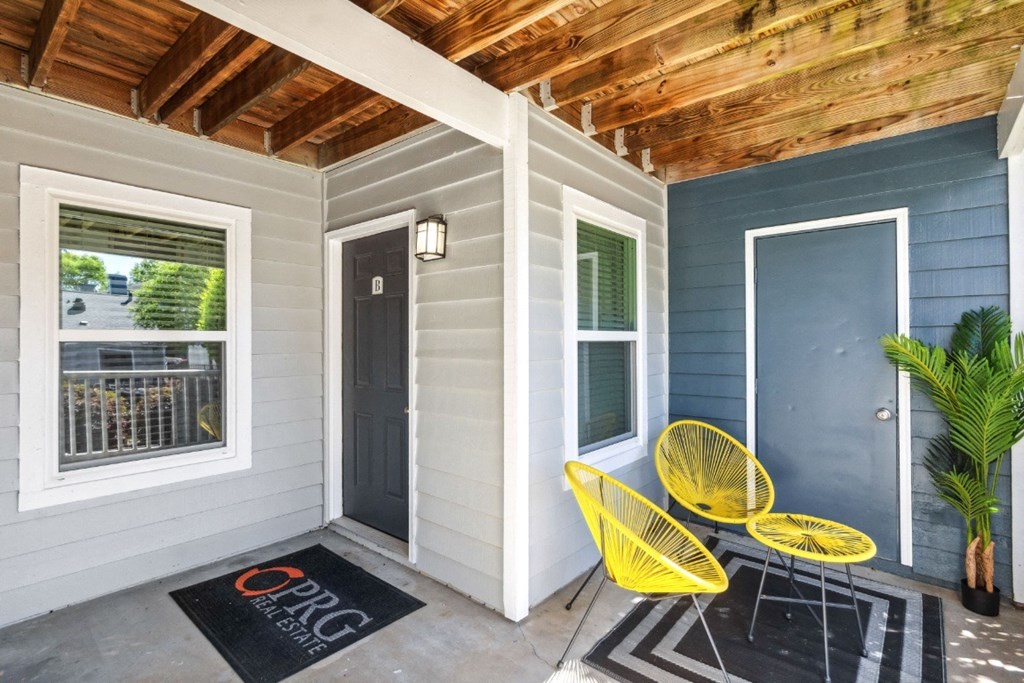 Porch with Chairs at Palmetto Place Apartments, Taylors, 29687