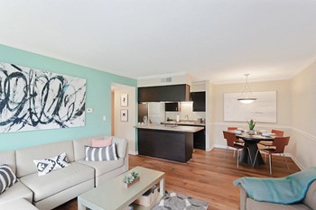Living room area Living room area at The Grove Apartments at Lyndon, Louisville - Photo Gallery 5