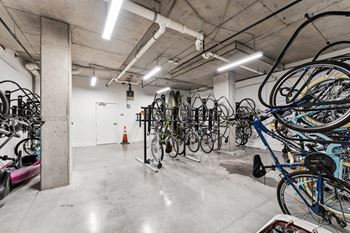 a room with many bikes hanging on a rack at Hydro, Richmond, VA