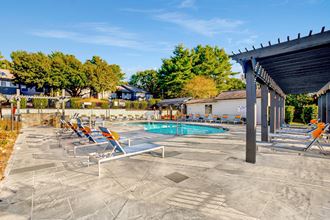 Poolside Sundeck With Relaxing Chairs Poolside Sundeck With Relaxing Chairs at Edgemont Apartments, PRG Real Estate, Greenville, SC - Photo Gallery