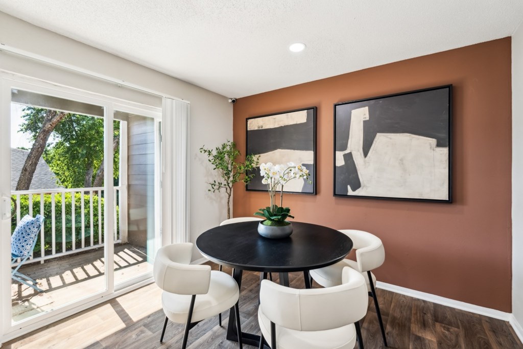 A dining room with a table and chairs. at Woodcreek Apartments, North Carolina, 27511