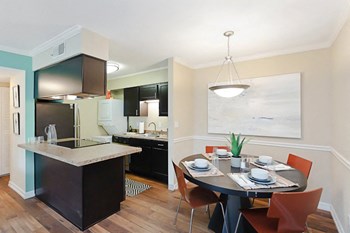 Kitchen and Dining Kitchen and Dining at The Grove Apartments at Lyndon, Louisville, Kentucky - Photo Gallery 6
