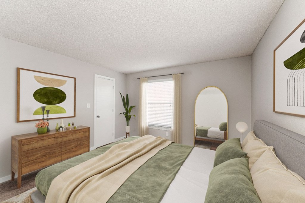 a bedroom with a bed and a dresser and a window