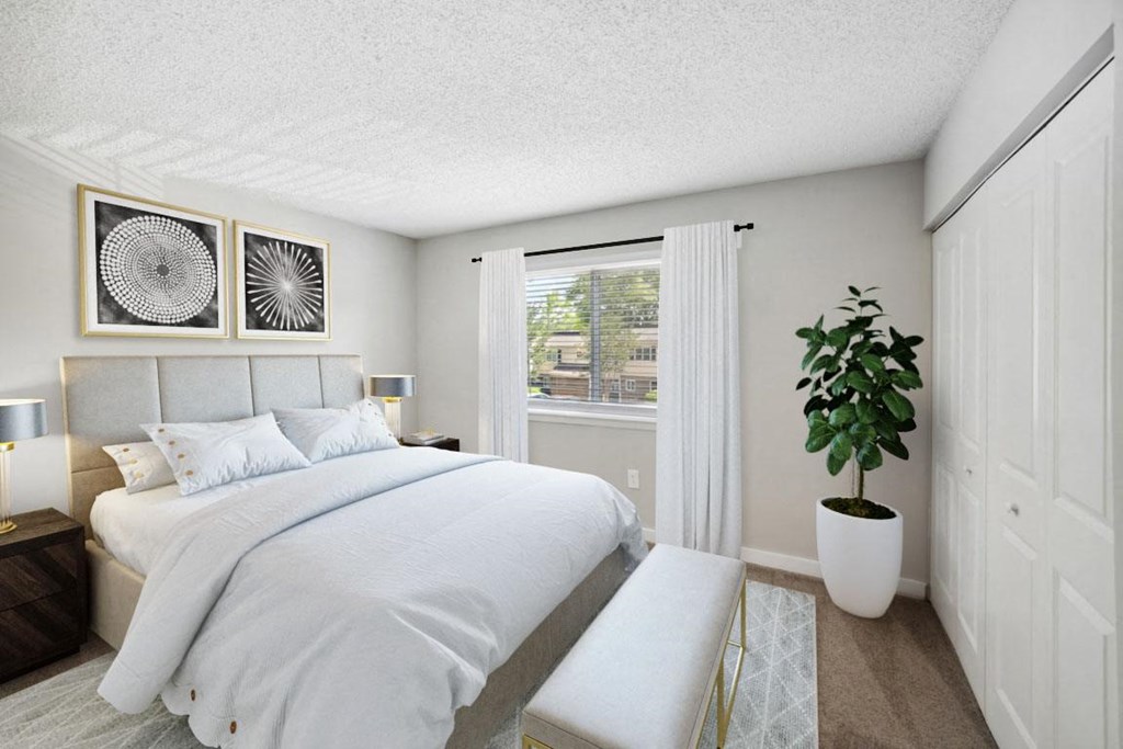 Bedroom with Large Bed at Lakecrest Apartments, PRG Real Estate Management, Greenville, SC