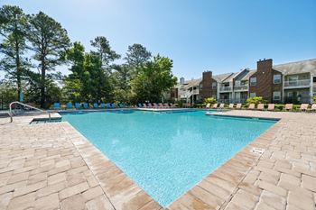 the preserve at ballantyne commons pool and resort style amenities with apartment buildings