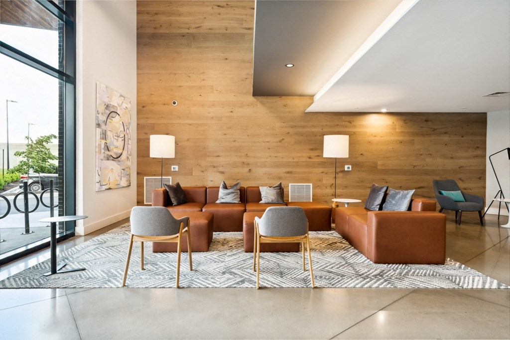 a living room filled with furniture and a large window at Hydro, Richmond, VA
