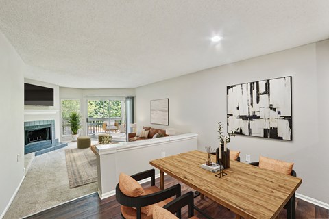 A dining room with a wooden table and chairs at Beacon Ridge Apartments, PRG Real Estate Management, Greenville, 29615