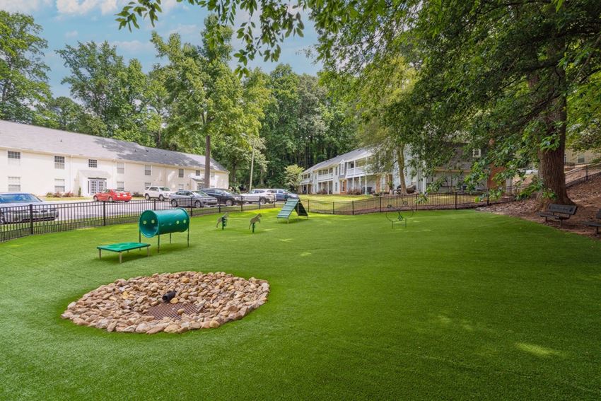 our apartments offer a dog park with a kennel and plenty of room to run our apartments offer a dog park with a kennel and plenty of room to run at Lake Johnson Mews, North Carolina