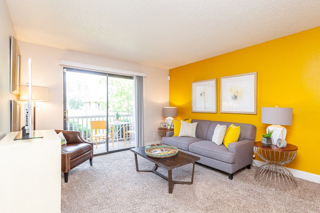 Spacious Living Room With Private Balcony at The Reserve At Barry Apartments, Kansas City, 64154