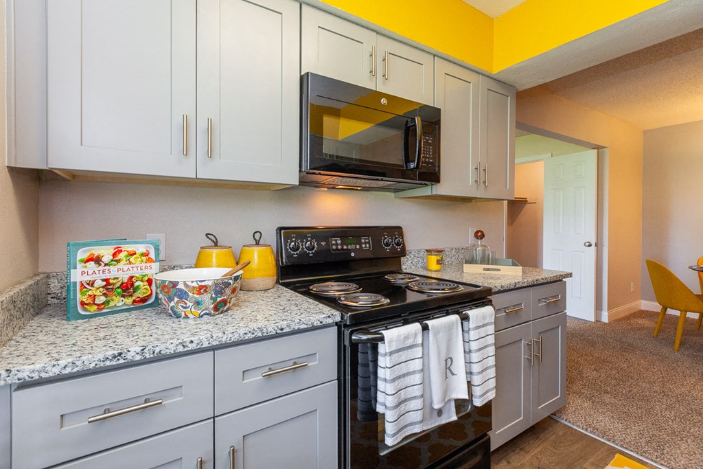 Gas Range Offered at The Reserve At Barry Apartments, Kansas City