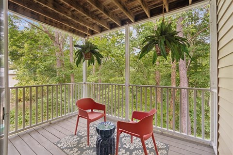 Private apartment patio with wooded views at Park Ridge Estates
