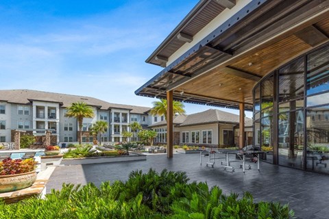 Patio with Tables and Chairs at The Loree, Jacksonville, FL, 32256